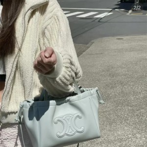 셀린느 CELINE 퀴르 트리오페 드로스트링 카바스 토트백 199978