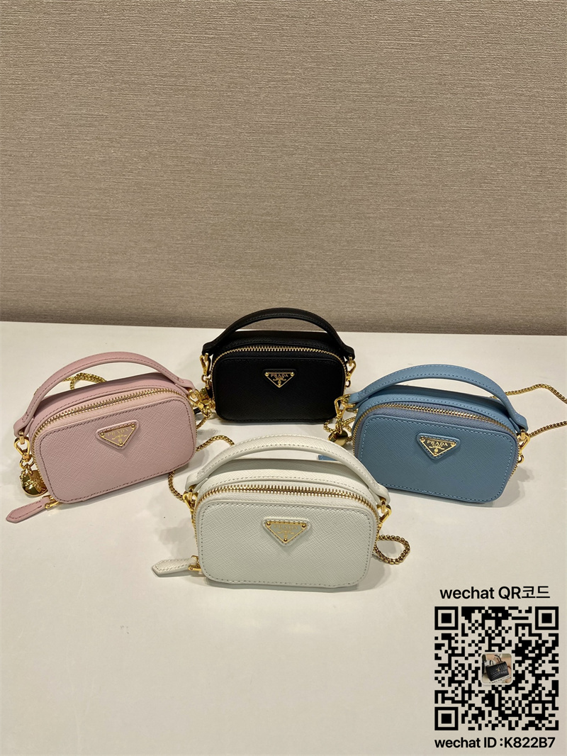 프라다 PRADA 페이턴트 가죽 미니 파우치 1NR025